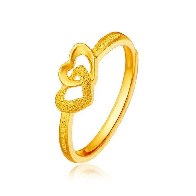 Gold heart-shaped ring with textured finish
