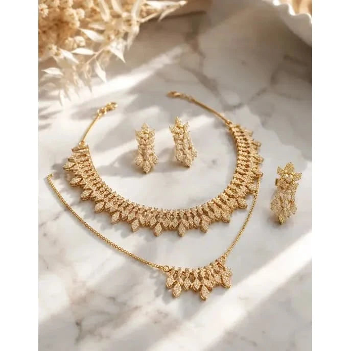 Elegant HAFIZ AND CO jewelry set featuring intricate necklace and matching earrings, crafted with detailed designs and sparkling accents.