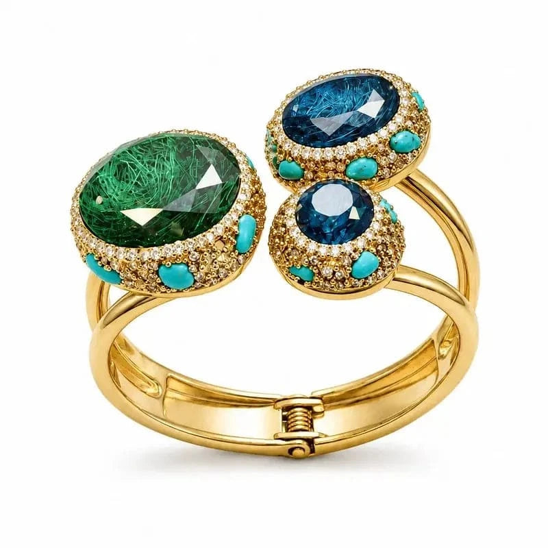 Luxury gold-toned gemstone bypass bangle by HAFIZ AND CO featuring a stylish bypass design and elegant gemstone accents.