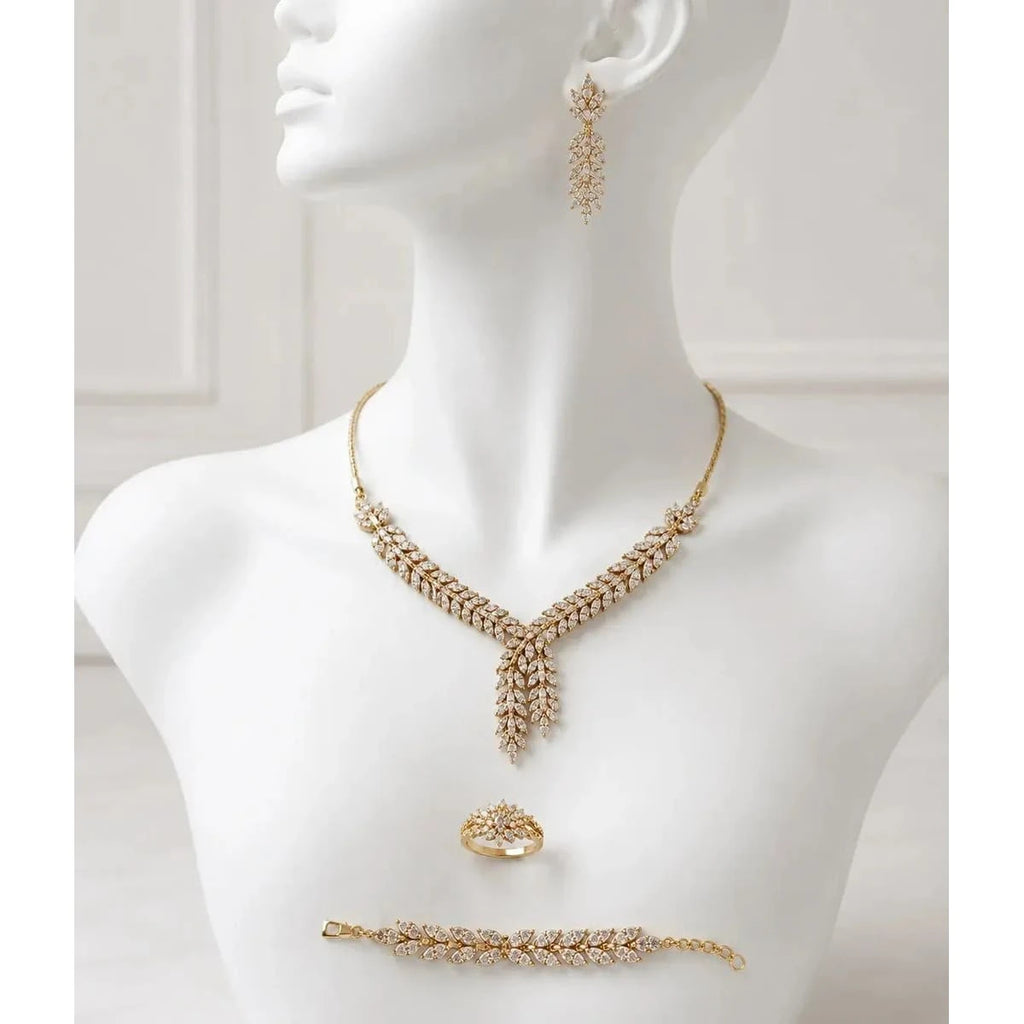 HAFIZ AND CO Golden Laurel jewelry set featuring matching necklace and earrings with intricate gold design.