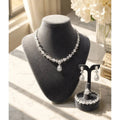 HAFIZ AND CO premium jewelry set featuring matching necklace, earrings, and bracelet with intricate design and sparkling embellishments.