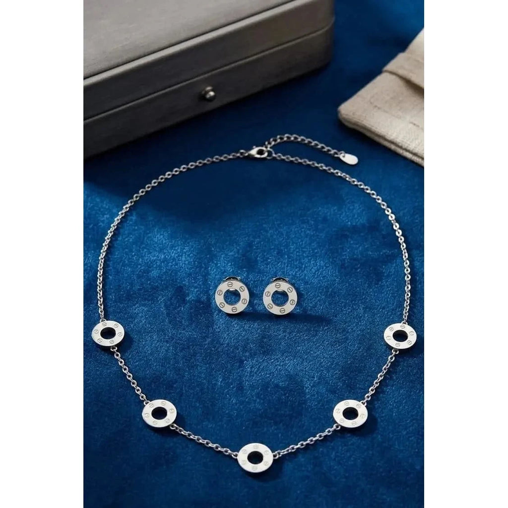 HAFIZ AND CO screw motif necklace from jewelry set featuring metallic chain with screw design, stylish accessory for casual or formal wear.