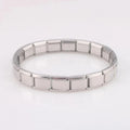 Silver HAFIZ AND CO stretch link bangle with sleek, interconnected design, showcasing a stylish and flexible jewelry accessory.