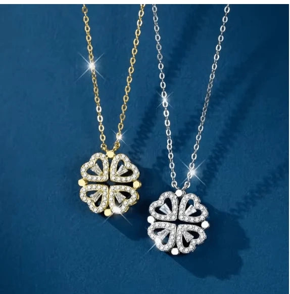 Gold Flower Four Leaf Necklace by HAFIZ AND CO featuring a delicate four-leaf clover pendant on a fine chain.