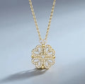 Gold flower four-leaf necklace by HAFIZ AND CO featuring a delicate pendant on a fine chain.
