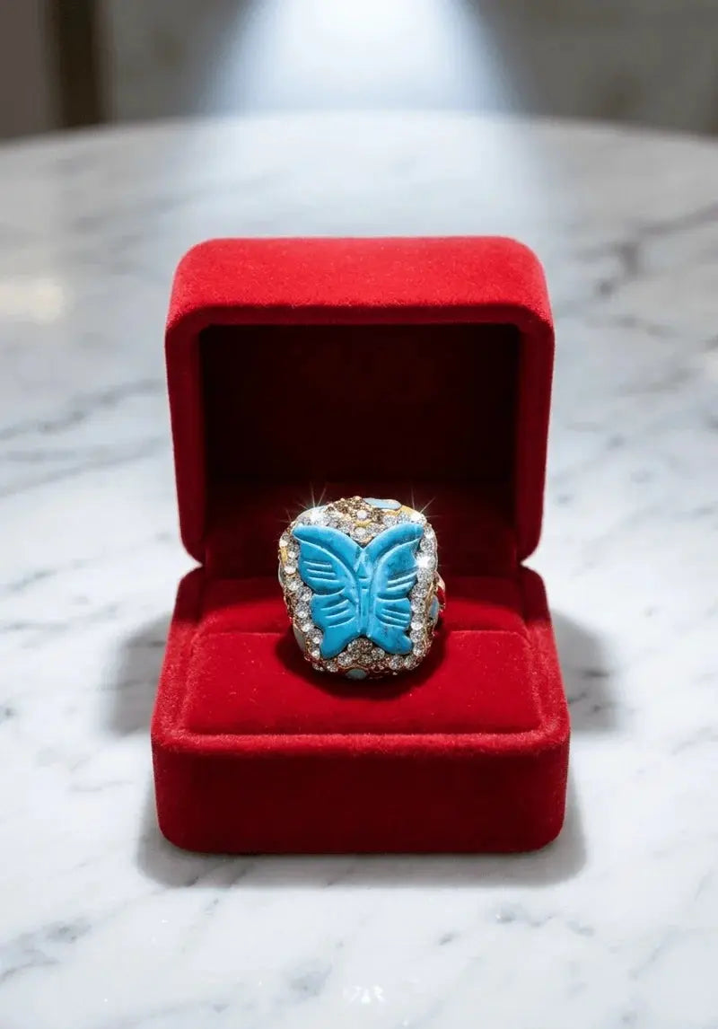 HAFIZ AND CO butterfly crystal ring featuring a delicate butterfly design with sparkling crystals on a silver band.