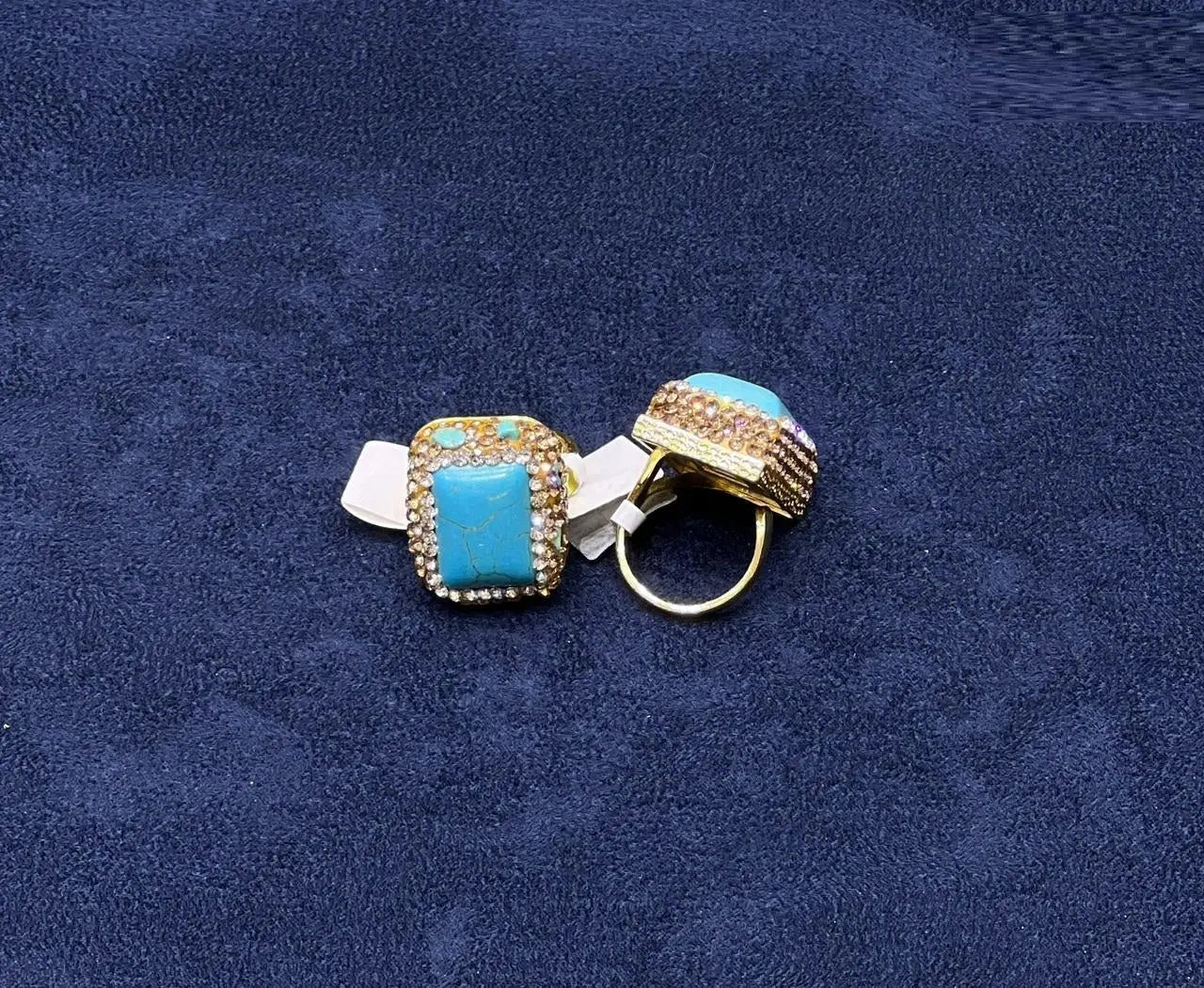 HAFIZ AND CO turquoise statement ring showing a bold turquoise stone set in a stylish silver band.