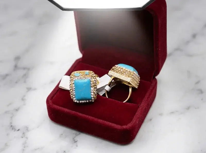 HAFIZ AND CO turquoise statement ring with bold design and silver band, featuring a large turquoise gemstone centerpiece.