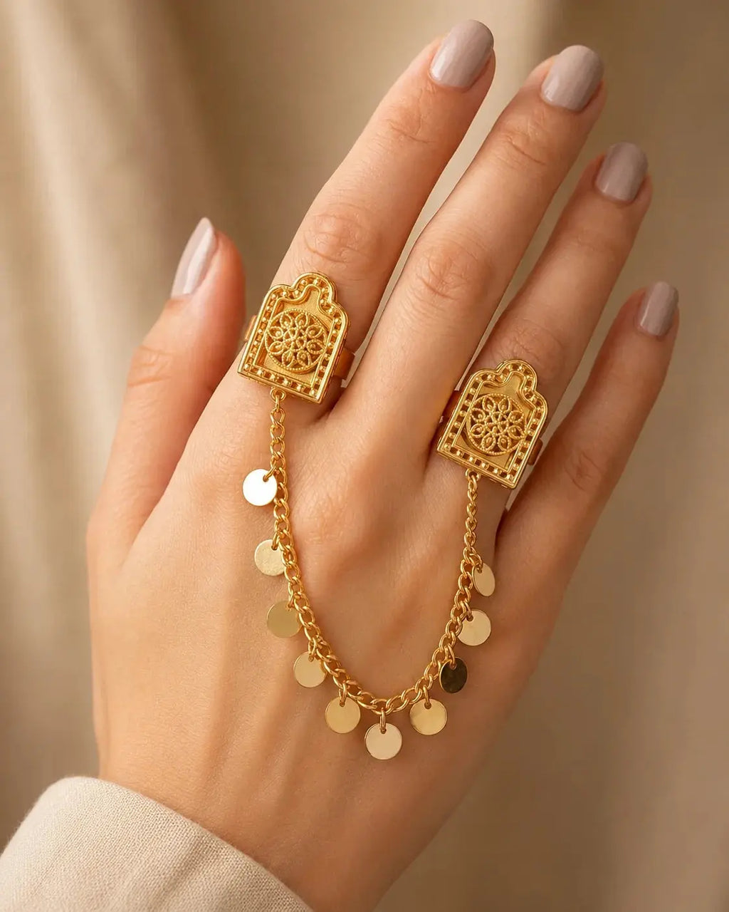 HAFIZ AND CO finger chain ring with layered silver design, featuring a sleek, contemporary style for bold jewelry looks.