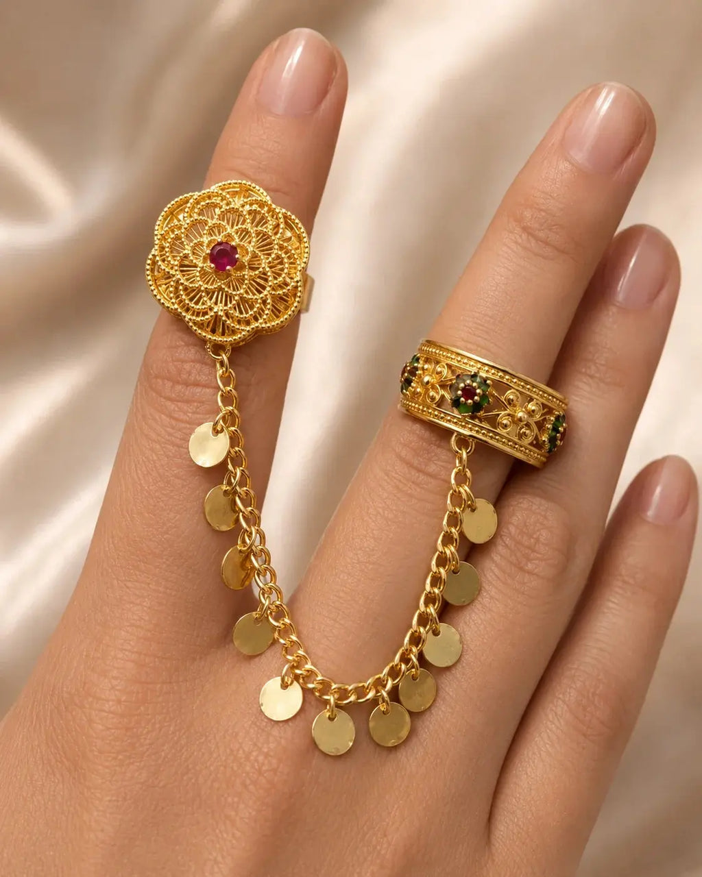 Gold filigree chain ring by HAFIZ AND CO featuring intricate gold craftsmanship and delicate chain design.