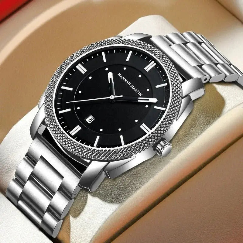 Men's stainless steel watch by Zambeel with a sleek round dial and metallic band, showcasing a modern, elegant design.