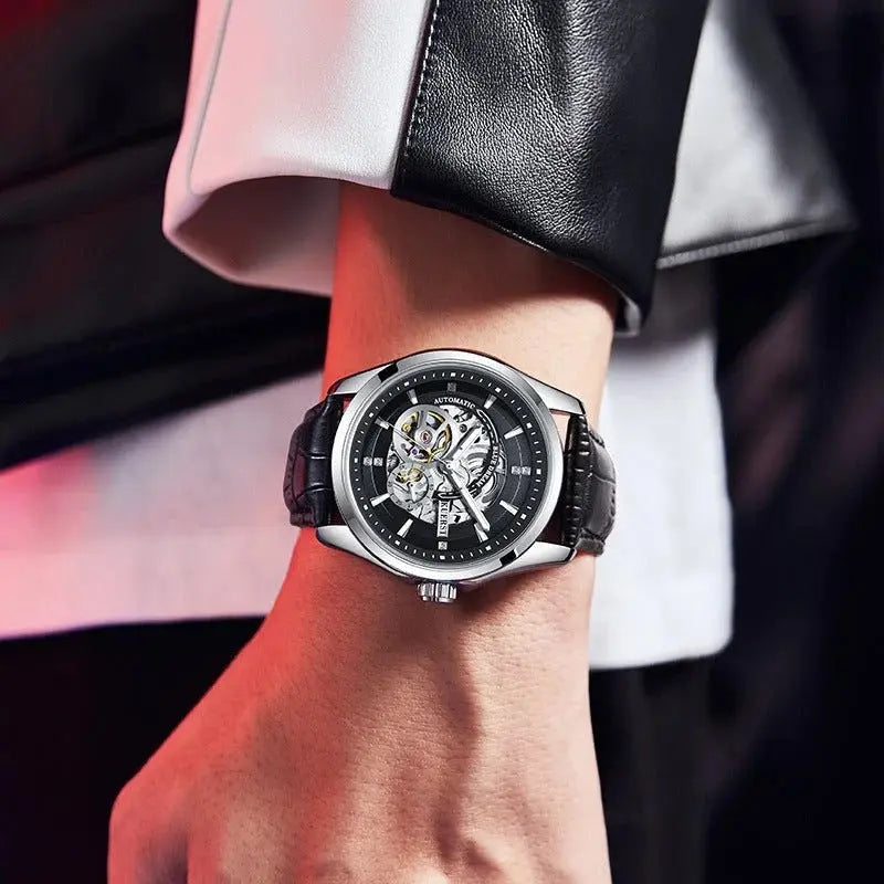 Zambeel waterproof automatic mechanical watch with white and black strap, luminous dial, and sturdy design.