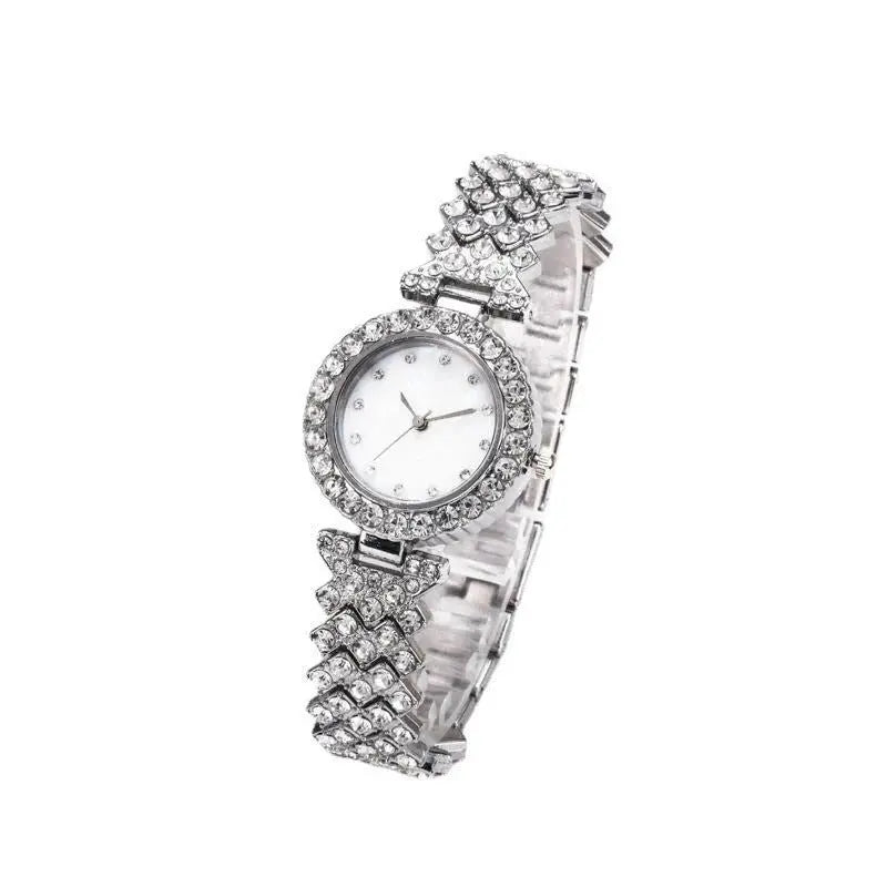 Gold women's quartz watch by Zambeel with diamond accents and alloy band, elegant and stylish timepiece.