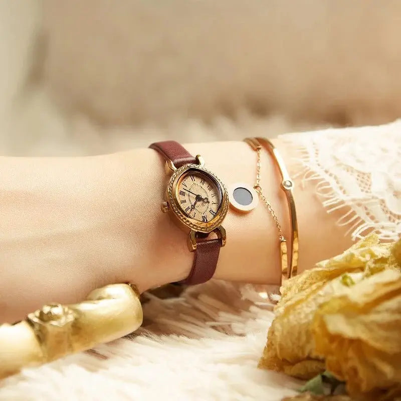 Zambeel waterproof quartz watch with oval belt design, showcasing a sleek dial and durable strap.